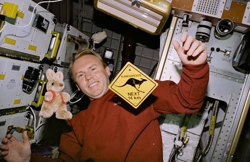 Andy Thomas with some Australian souvenirs during his first spaceflight in 1996.