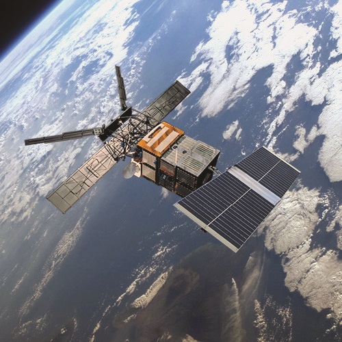 Endeavour Space Telescope (circled) in the Shuttle cargo bay and a smaller image of the ERS satellite in orbit.