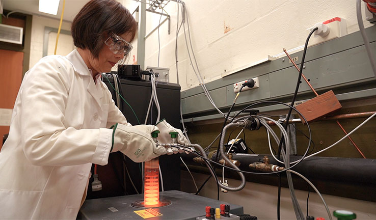 A measurement scientist working in a laboratory. A measurement scientist working in a laboratory.