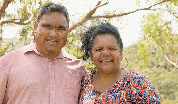 Photo of two Indigenous business owners in a bush setting.