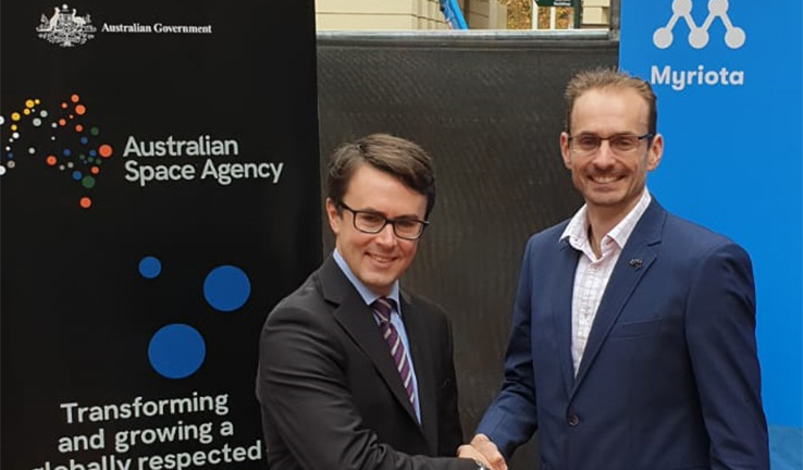Photo of Myriota CEO and Australian Space Agency's Deputy Head shaking hands Photo of Myriota CEO and Australian Space Agency's Deputy Head shaking hands