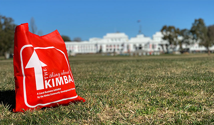 A red Kimba shopping bag on the lawns outside old Parliament House in Canberra A red Kimba shopping bag on the lawns outside old Parliament House in Canberra