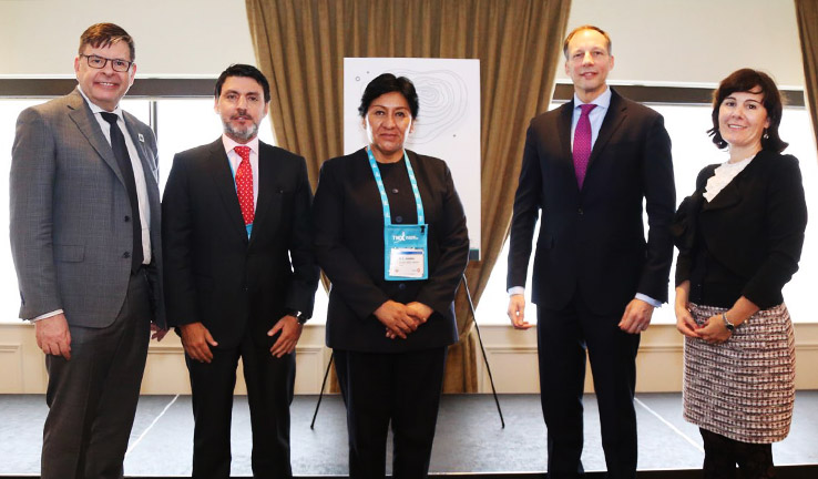 Photo of officials from Australia, Canada, Peru and Botswana at the signing.