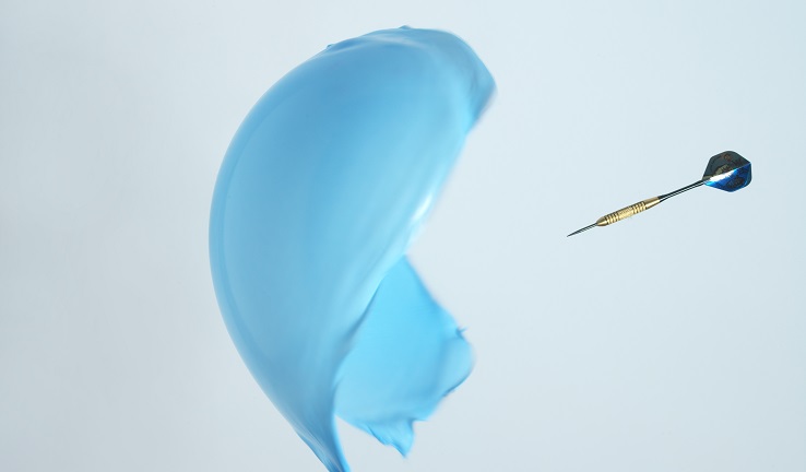 A new interview method busted the assumptions of researchers A balloon bursting after being pierced with a dart