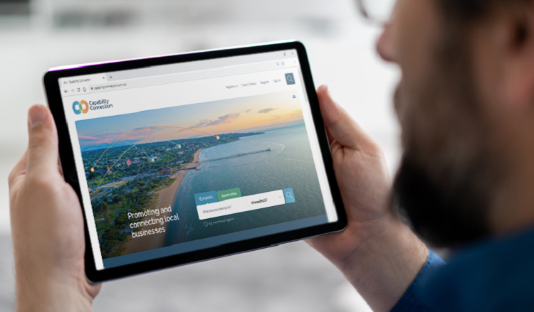 Image of a man viewing the Capability Connection website on a tablet device.