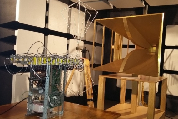 Complex electronic device with wires in white soundproof chamber