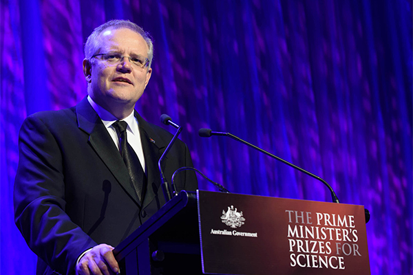 Photo of Prime Minister speaking at the podium.