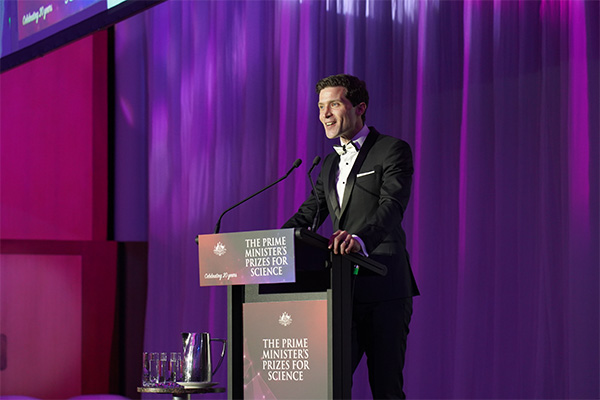 Photo of Professor Alan Duffy on stage at the award ceremony.