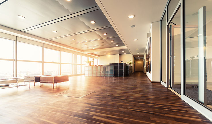 Photo of an entrance, lobby and lounge inside a public building.