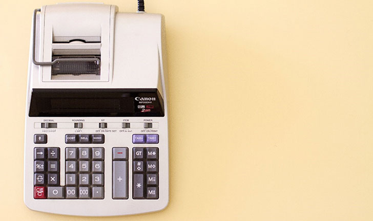 Photo of a manual calculator, which used to be how businesses would do their accounting.