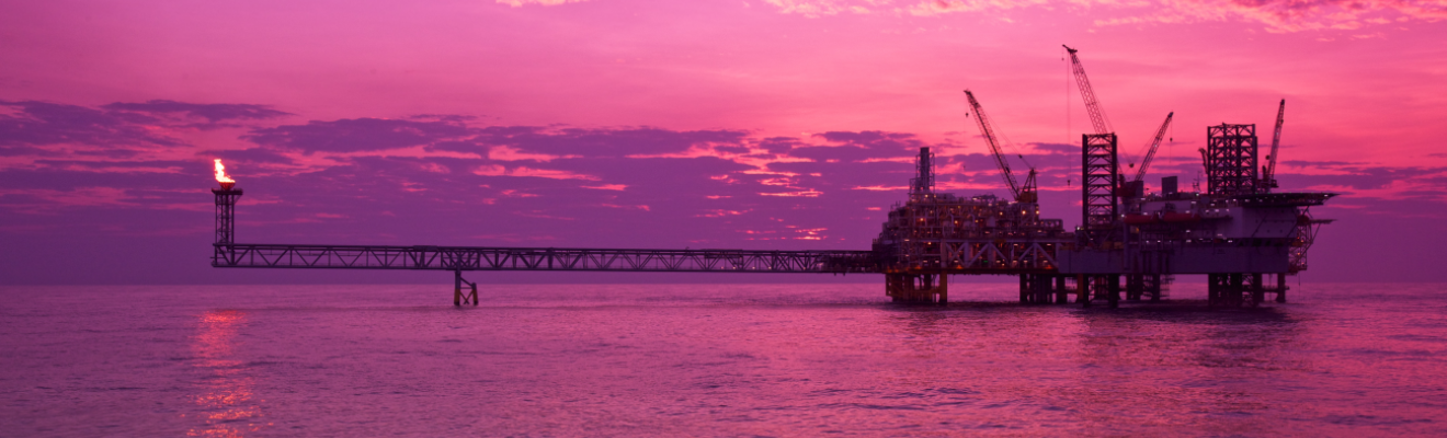 Offshore gas field at sunset