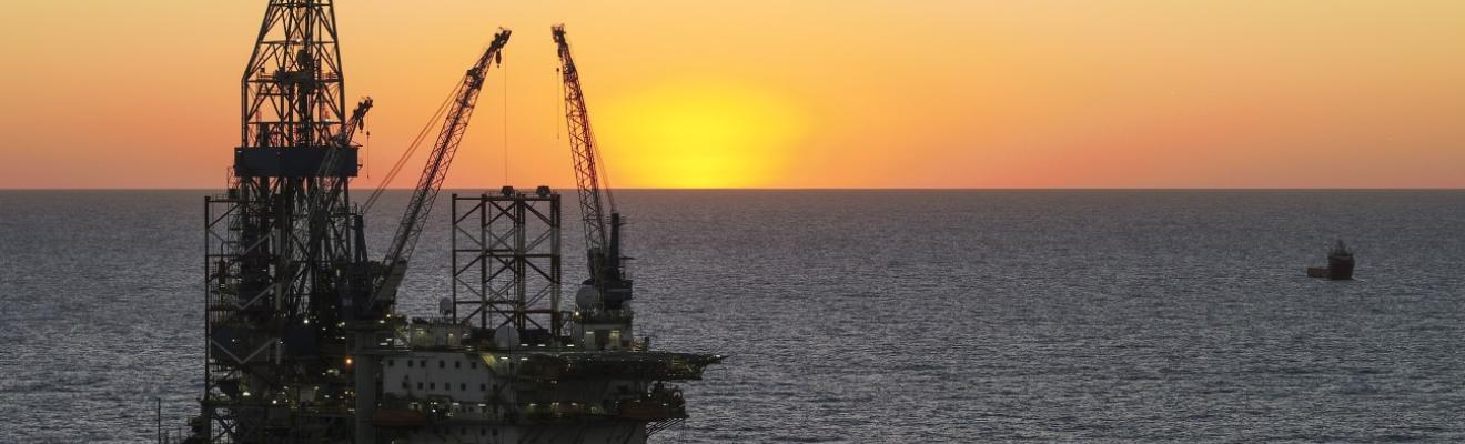 Offshore exploration equipment at sunset 