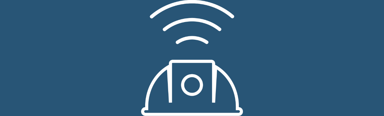 Icon of a construction hard hat on a blue background.