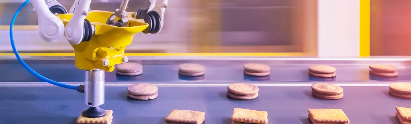 A robot making biscuits in a factory