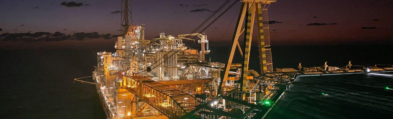 A photo of the Northern Endeavour facility at night. 