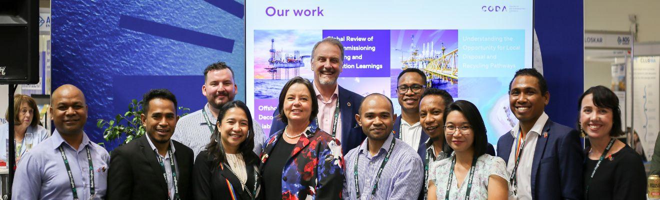 Timorese LNG Fellowship participants pictured with Minister King, Dr Francis Norman, and DISR staff at the AOG conference in Perth. Photo credit CODA.