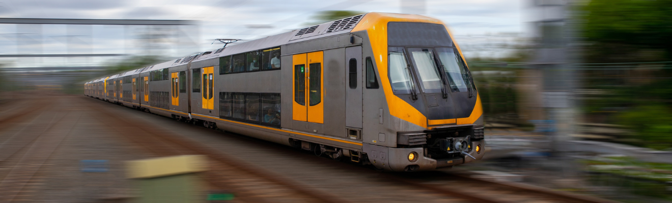 Moving train in focus with blurred background