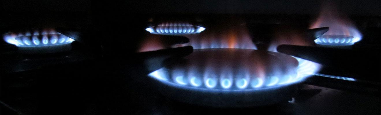 Several gas burners on a stove 