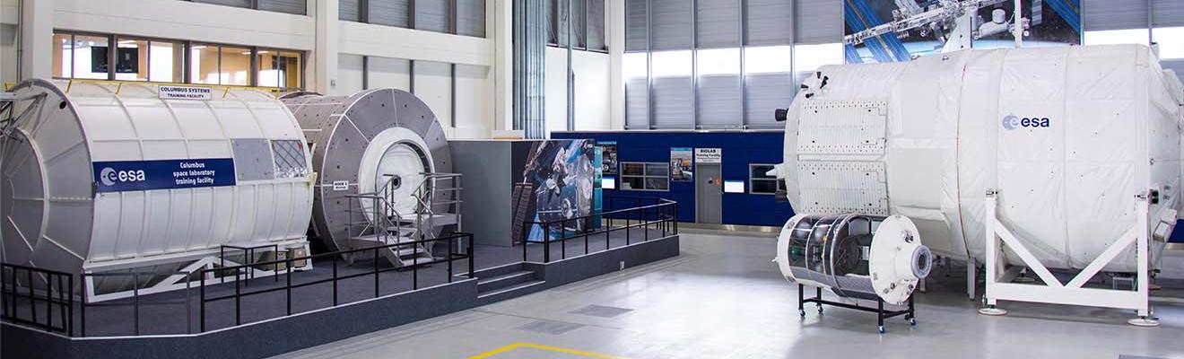 Inside the European Astronaut Centre with large white chambers