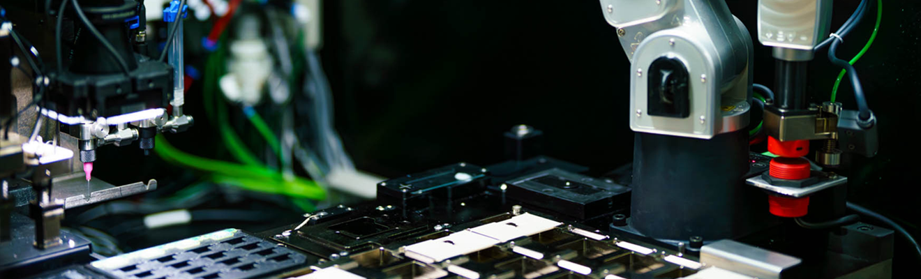 A robotic arm manufacturing optical switching technology. 