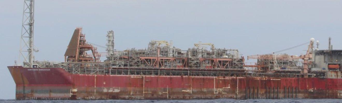 A photo of the Northern Endeavour oil vessel in the middle of the sea.