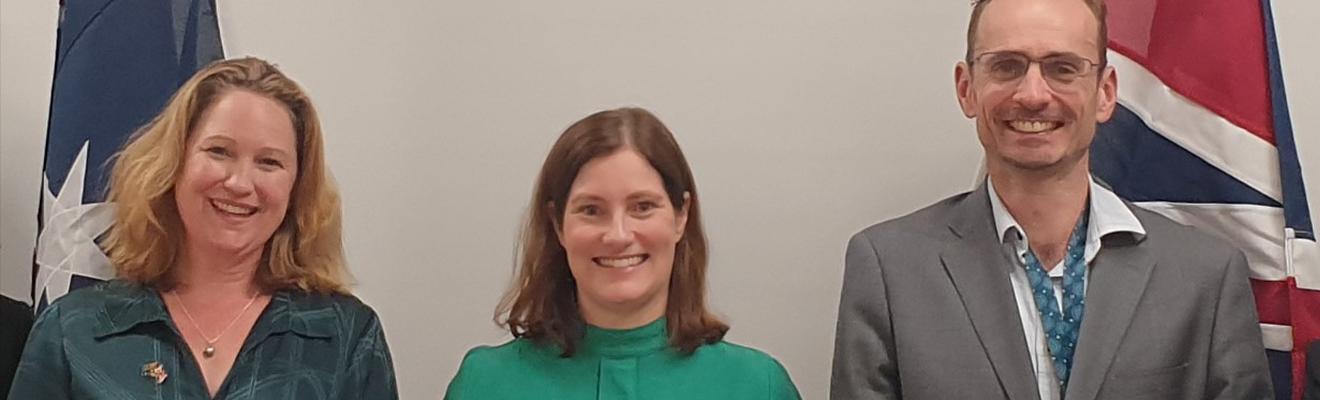 A group shot of 3 representatives from the meeting