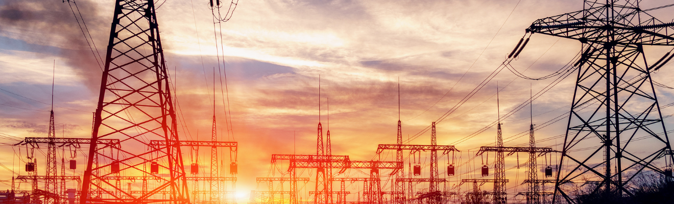 Electricity substation silhouette on a sunset background