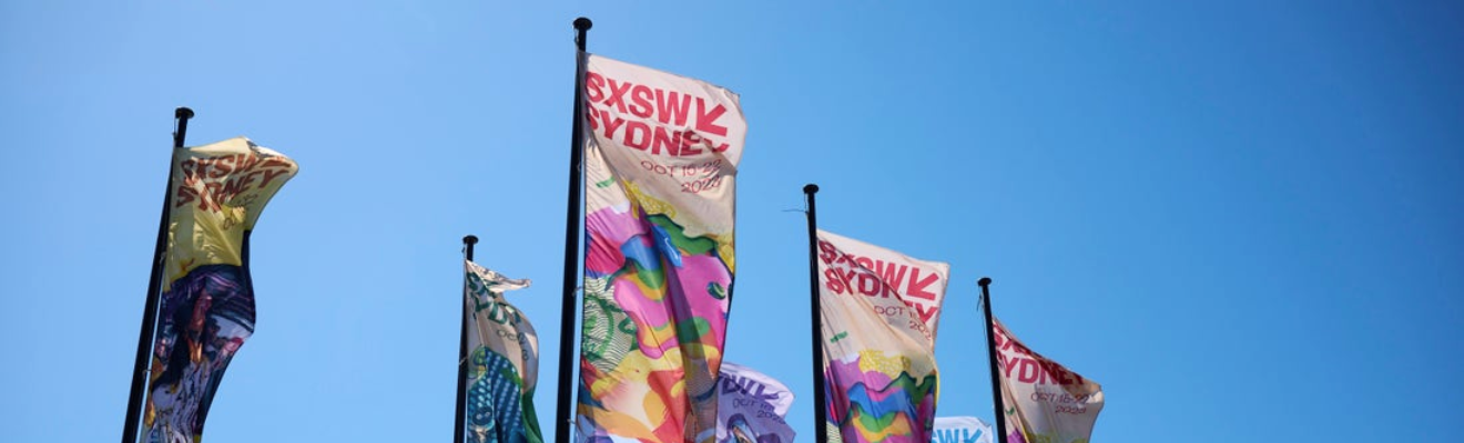 Flags promoting Sydney SXSW