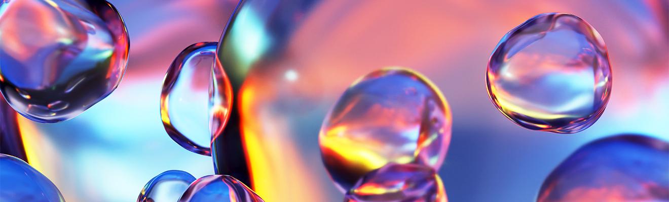 Clear scientific water bubbles on a colourful background 