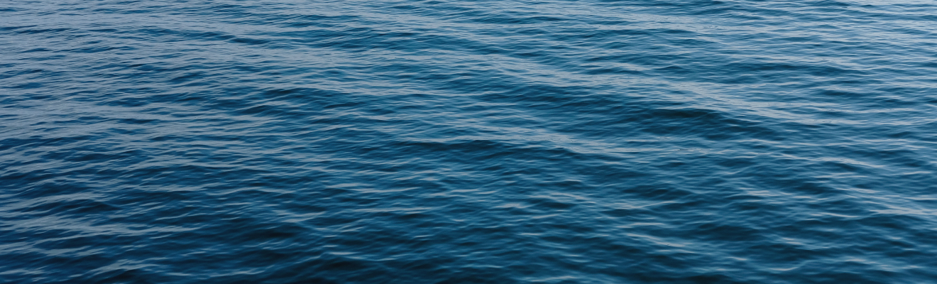 Close up shot of calm, blue ocean waters 