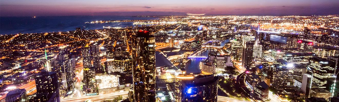 Melbourne city skyline lit up at night