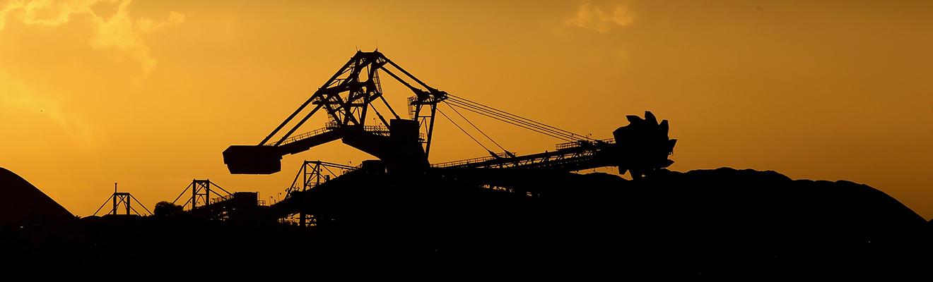 Silhouette of modern mining equipment on a mine site