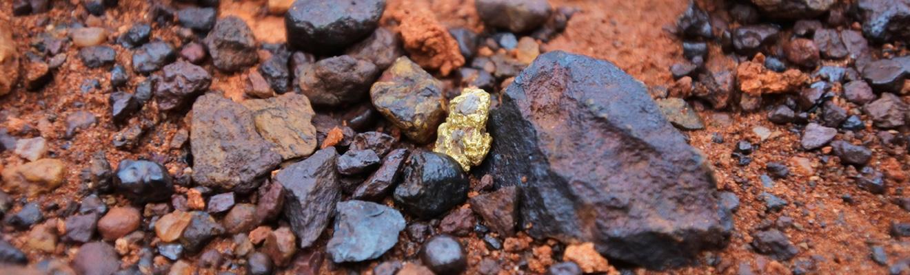 A large gold nugget found among may stones in the Western Australia outback