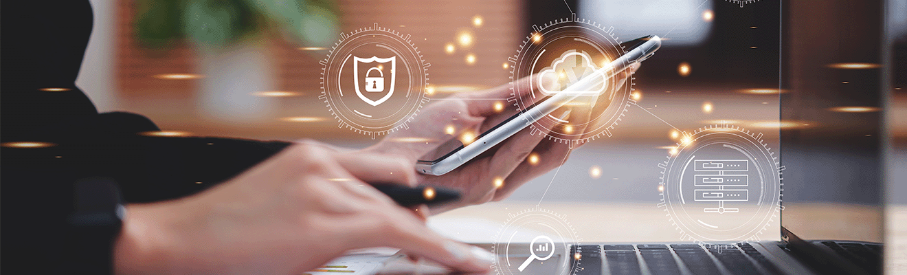 Photo of a person on their laptop holding a mobile phone. Superimposed with icons representing different technologies.