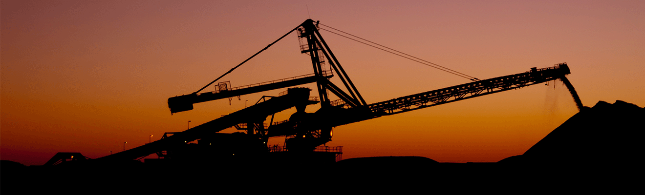 Silhouette of modern mining equipment on a mine site