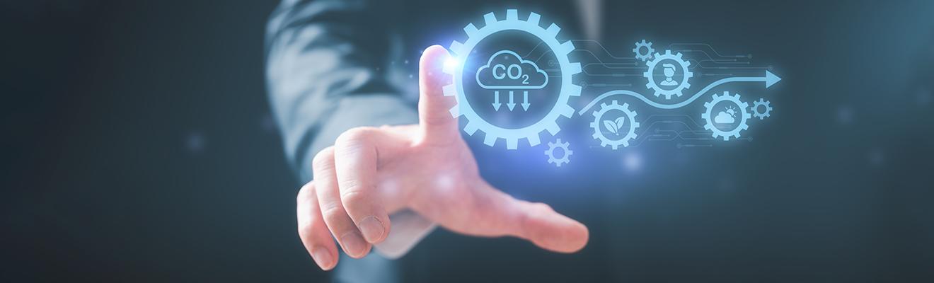 Hand touching digital icons symbolising sustainable industries