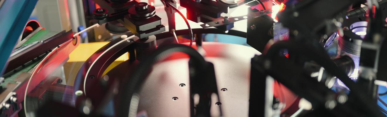 Robotic system assembles electronic components with high-speed precision, emphasising industrial automation, circuit production, and AI-driven electronics.