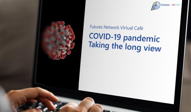 The Futures Team hosted a virtual café to explore post-pandemic scenarios. Photo of someone typing on a laptop with the splash page of a virtual café about the Covid-19 response on the screen.