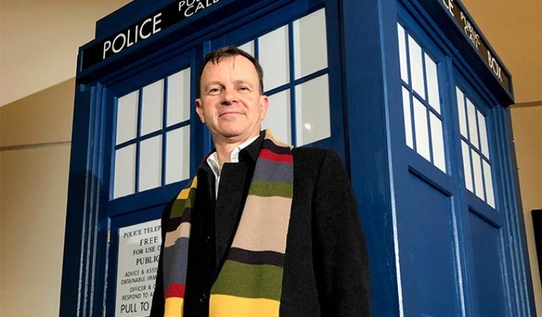 Photo of Dr Bruce Warrington in front of a Tardis post office box provided by the ABC. Photo of Dr Bruce Warrington in front of a Tardis post office box provided by the ABC.