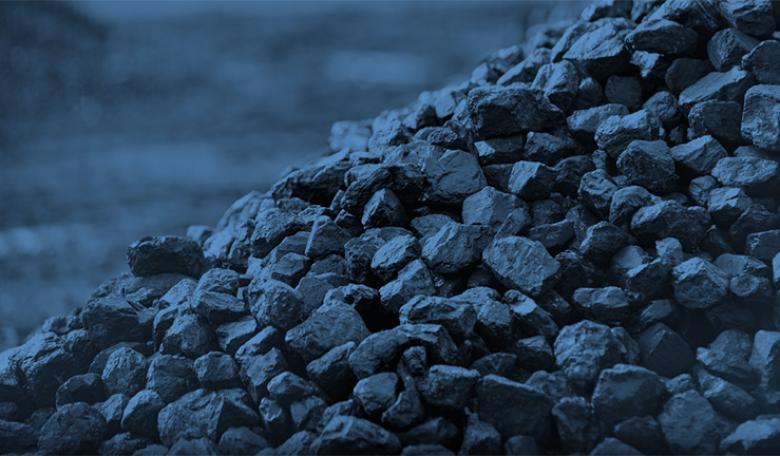 An image of coal on the Coal in India 2019 report cover.
