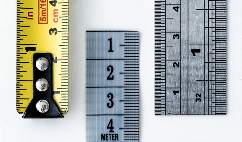 Photo showing rulers and measuring tape. Photo showing rulers and measuring tape.