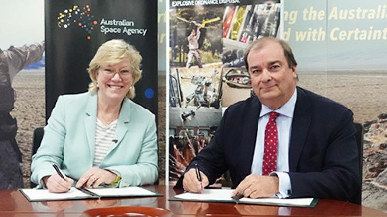 Photo of Dr Megan Clark AC and Mr Philippe Odouard, Managing Director of XTEK signing papers. Photo of Dr Megan Clark AC and Mr Philippe Odouard, Managing Director of XTEK signing papers.