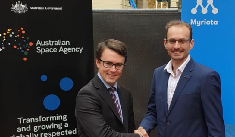 Photo of Myriota CEO and Australian Space Agency's Deputy Head shaking hands Photo of Myriota CEO and Australian Space Agency's Deputy Head shaking hands