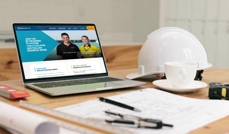 Image of a construction worker's desk with a laptop open on the ICN Gateway website