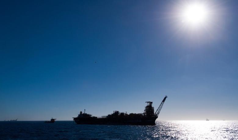 The Northern Endeavour facility in the ocean with a blue sky in the background.