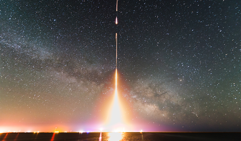 A time-lapse photograph of a rocket launch. A time-lapse photograph of a rocket launch.