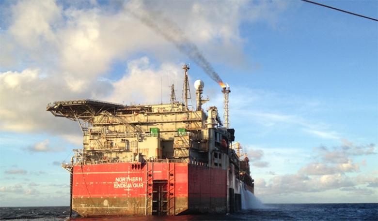 The Northern Endeavour facility in the ocean with a blue sky in the background.