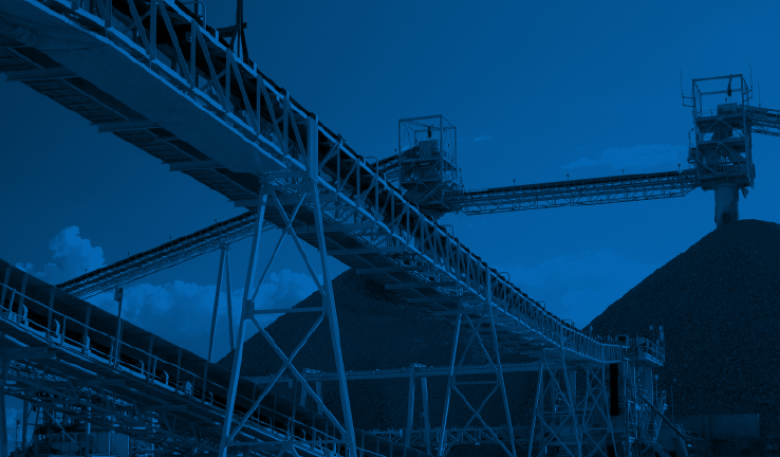 Image from the report cover showing mining equipment.