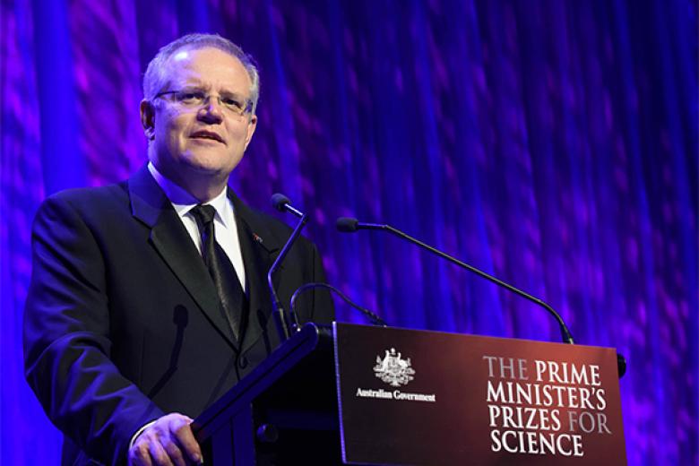 Photo of Prime Minister speaking at the podium.