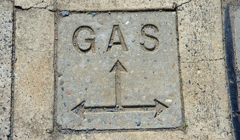 Ground signage indicating gas infrastructure